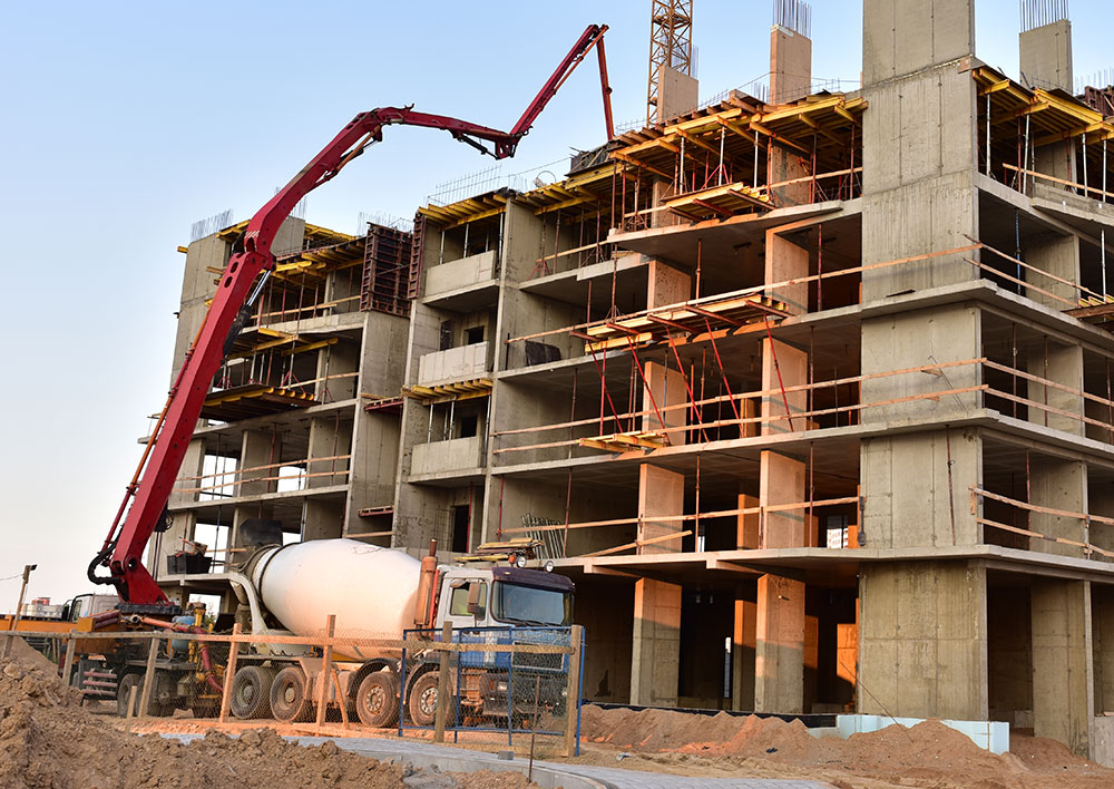 Formworks and pouring concrete at building site
